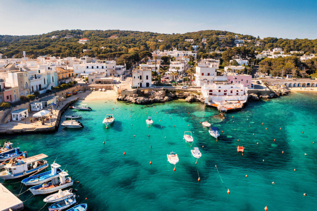 Italian lakeside town surrounded by mountains and blue water